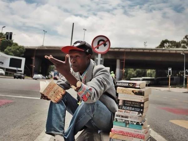 Homeless Man Reviews Books for Sale